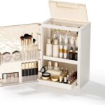 AERCIINC large beige makeup organizer with multiple compartments, brush holder, and two pull-out drawers on a vanity.