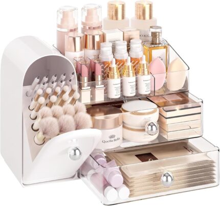 A white Delamu large makeup organizer with clear drawers and a retro fridge-style top compartment holding makeup brushes and