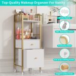 A gold and white HapiRm rolling makeup cart organizer with two fabric drawers, filled with various cosmetics and skincare pro