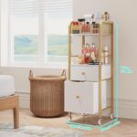 A gold and white HapiRm rolling makeup cart organizer with two fabric drawers, filled with various cosmetics and skincare pro