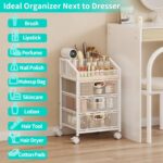 A white HapiRm rolling makeup cart organizer with three visible mesh drawers and a divided top section, filled with various b