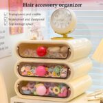 MavHubrix 3-Tier Cream White Makeup Organizer with colorful knobs on a vanity, holding cosmetics and small items.