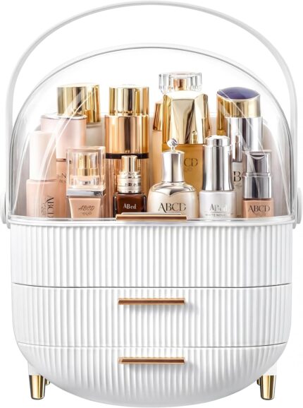 A white and gold NestOrganix makeup organizer with three drawers and a clear top cover, filled with various cosmetics.