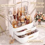 A white and gold NestOrganix makeup organizer with three drawers and a clear top cover, filled with various cosmetics.
