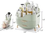 Pajiriona sage green makeup organizer with two drawers and a top compartment, featuring a handle, displayed on a vanity.