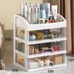 White PTBSZCWY makeup organizer with three pull-out drawers and an open top compartment for displaying cosmetics.