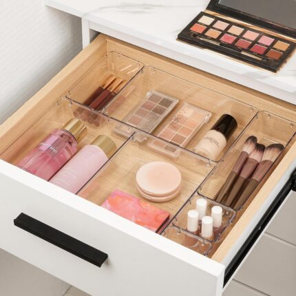 A set of Vtopmart 10 clear rectangular plastic drawer organizer bins in various sizes, neatly arranged.