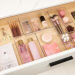 A set of Vtopmart 10 clear rectangular plastic drawer organizer bins in various sizes, neatly arranged.