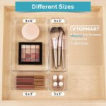 A set of Vtopmart 10 clear rectangular plastic drawer organizer bins in various sizes, neatly arranged.