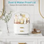 White Vtopmart 3-Tier Skincare Organizer with clear lid, two drawers, and gold handles, filled with beauty products.