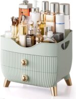 Green YGJT makeup organizer with two drawers and a top compartment, featuring a golden handle and filled with various cosmeti