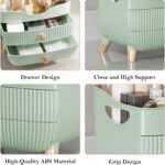 Green YGJT makeup organizer with two drawers and a top compartment, featuring a golden handle and filled with various cosmeti